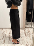 Pantaloni neri a vita alta con tasche e pinces anteriori