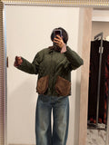 Tensione giacca trapuntata verde oliva con tasche in velluto a coste